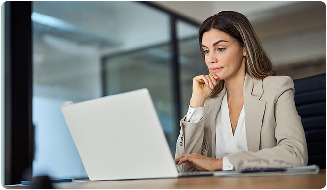 Female attorney on laptop at desk