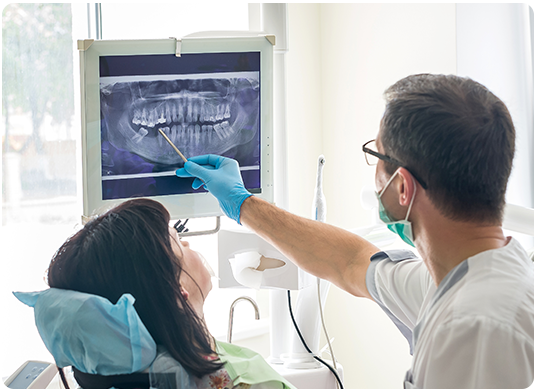 Dentist office, person having their teeth looked by dentisit