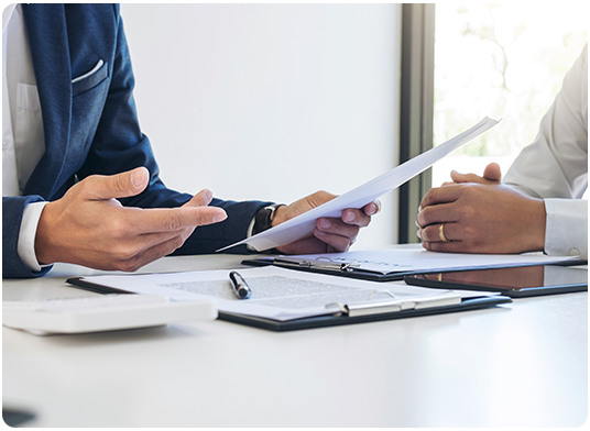Professional Liability Paperwork being reviewed at desk