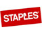 Logo of Staples with white text on a red, tilted rectangle background. The letter L is stylized to resemble a partial staple.